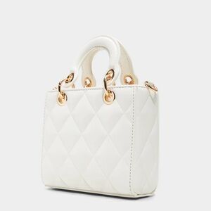 Aldo Sunblinggx white woman’s top handle crossbody bag